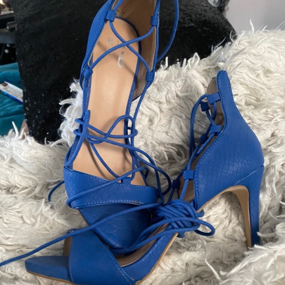 Beautiful blue lace up heels.